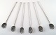 Set of 6 cocktail sticks in plated silver.
