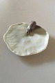 Royal 
Copenhagen Leaf 
Shaped Ashtray 
with Snail No 
6/3. 
10.5 cm dia (4 
9/64"). 3.3 cm 
H (1 ...