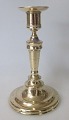 Empire 
candlestick in 
brass, 19th 
century. 
Denmark. Round 
foot and 
profiled 
strain. On foot 
...