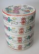 Chinese food 
container, 
famille rose, 4 
parts, 19th 
century. 
Cylinder shape. 
Polychrome ...