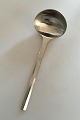 Georg Jensen 
Stainless 
'Prism, Matt' 
Sauce Ladle. 
Measures 18 cm 
/ 7 3/32 in.