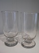 Et par toddy 
glas med kort 
tyk stilk på 
lige afknækket 
fod. Ca. 1900. 
Højde: ca. 15 
cm. Sælges ...