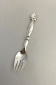 Georg Jensen 
Sterling Silver 
Ornamental 
Serving Fork No 
102. From the 
1930's 
Measures 22 cm 
...