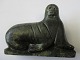 Greenlandic 
soapstone 
figure, 20th 
century. A 
walrus. Unclear 
signed. 10 x 
7.1 cm. Teeth 
missing.