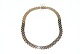 Cube Necklace, 
14 Carat Gold
Stamped: 585, 
BH
Goldsmith: 
Flemming Lund
Length 40 cm.
Width 9 ...