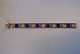 Gold Bracelet 
with lapis, 14 
Carat Gold
Stamp: 585, 
OFP
Goldsmith: 
1966-1988 Ove 
Fogh ...