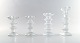 4 Iittala 
Festivo 
candlesticks, 
Design: Timo 
Sarpaneva.
Finland 1980s.
Measures: 12.5 
to 18 ...