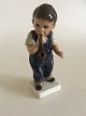 Dahl Jensen 
Figurine of a 
boy with Pipe 
No 1027.
Measures 
15,5cm.
