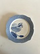 Royal 
Copenhagen Art 
Nouveau Plate 
with fish 
border.
From before 
1900.
Measures 9 
1/2".