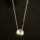 Georg Jensen 
Pendant in 
Sterling Silver 
og 18 kt Gold # 
510 - CAVE 
Designed by 
Jacqueline ...
