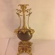 Ornamental 
decorative 
vase.
top and bottom 
gilt bronze.
sides flanked 
by dolphins.
Height: 23 ...