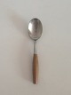 Fjord IHQ 
Quistgaard 
Steel and Teak 
Spoon.
Measures 18 cm 
/ 7 3/32 in.