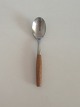 Fjord IHQ 
Quistgaard 
Steel and Teak 
Spoon.
Measures 15.8 
cm / 6 7/32 in.