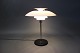 PH80 table lamp 
designed by 
Poul Henningsen 
and 
manufactured 
Louis Poulsen. 
The lamp was 
...