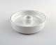 Blue Line faience/porcelain dinnerware by Aluminia / Royal Copenhagen.
Round candlestick no. 3091