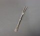 Serving fork in 
"Tang", 
hallmarked 
silver.
16 cm.
Ask for number 
in stock. All 
silver will ...