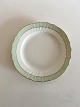 Royal 
Copenhagen 
Green Curved 
Luncheon Plate 
with Gold No 
1623. 22.5 cm 
(8 55/64")