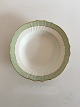 Royal 
Copenhagen 
Green Curved 
Deep Plate with 
Gold No 1616. 
22 cm (8 
21/32")
