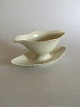 Royal 
Copenhagen 
Josephine Creme 
Curved 
Sauceboat. 25 x 
11 cm (9 27/32" 
x 4 21/64")