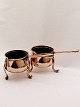Copper tripod 
with handle H. 
11 cm. 19th 
century.        
    No. 273596 
one sold