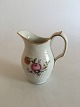Royal 
Copenhagen 
Trelleborg 
Creamer No 
1536. 11.5 cm 
tall (4 
17/32"). White 
with flower 
motif.