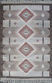 Rölakan carpet with geometric pattern in brown / red hues.Signed MJ.