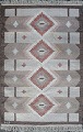 Rölakan carpet with geometric pattern in brown / red hues.
Signed MJ.