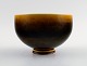Berndt Friberg (1899-1981), Gustavsberg Studio hand.
Ceramic Bowl, glaze in yellow and brown tones.