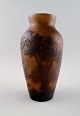 Emile Gallé art glass vase, France app. 1900.
Decorated with trees.