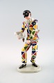 Harlequin, Royal Copenhagen figurine no. 061.
Porcelain figurine from the series Commedia dell