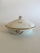 Royal 
Copenhagen 
Brown Iris Oval 
Bowl with Lid 
No 9348. 23.5 x 
18 cm. The gold 
at the top 
handle ...