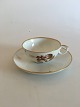 Royal 
Copenhagen 
Brown Iris Tea 
Cup and Saucer 
No 9186. The 
cup measures 
4.5 x 9.5 cm