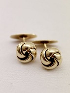B Hertz 14 carat gold knot cufflinks<BR>
sold