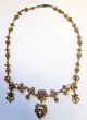 Antique 
necklace with 
numerous 
rubies, Ceylon, 
19th century. 
Gold plated 
silver. With 68 
pink ...