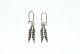 Geneva Earrings 
6 pins,  14 
carat gold New
Stamp: 585, 
BNH
Length 3.8 cm.
Very good ...