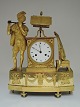 French gilded 
bronze clock. 
Ornamented with 
flute player. 
White dial. 
Height 38 cm. 
Produced ...