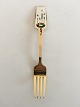 Anton Michelsen 
Christmas Fork 
1949 Gilded 
Sterling Silver 
with Enamel
The Advent 
wreath adorns 
...