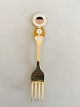 Anton Michelsen 
Christmas Fork 
1969 Gilded 
Sterling Silver 
and Enamel
The cartoonist 
and poster ...