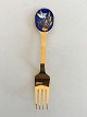 Anton Michelsen 
Christmas  Fork 
1985 Gilded 
Sterling Silver 
with enamel
The textile 
weaver and ...