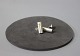 Cuff links in 
titanium with 
18 ct. gilded 
stribe, stamped 
SIK TITAN.
2 cm long and 
9 mm wide.