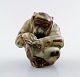 Knud Kyhn for Royal Copenhagen, stoneware figure, monkey. Light glaze.