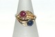 Gold ring with 
red and blue 
stones 14 Karat
Stamp: 585 HS
Size: 55 / 
17.51 mm.
None or ...