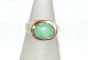 Gold ring with 
green stone, 14 
Carat
Stamp: 585, 
ESC
Size: 60 / 
19.10 mm.
None or ...