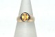 Gold ring with 
yellow stone, 
18 Karat Gold
Stamp: 750
Size: 52 / 
16.55 mm.
None or ...