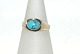 Goldring with 
light blue 
stones, 8 Karat 
Gold
Stamp: KL KL
Size: 58 / 
18.46 mm.
None or ...