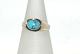 Goldring with 
light blue 
stones, 8 Karat 
Gold
Stamp: KL
Size: 58 / 
18.46 mm.
None or ...