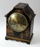 Console clock, 
20th century. 
Chinese box in 
lacquer work 
with polychrom 
decorations. 
French ...