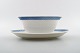 Blue Fan Royal 
Copenhagen 
porcelain 
dinnerware. 
2 pcs. Oval 
sauce boat on 
fixed base, no. 
...