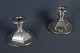 Silver 
candlesticks, 
marked 830, h: 
7 cm
