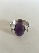 Georg Jensen 
Sterling Silver 
Torun Armring 
with Amethyst 
No 203. The 
Bangle has a 
diameter of ...